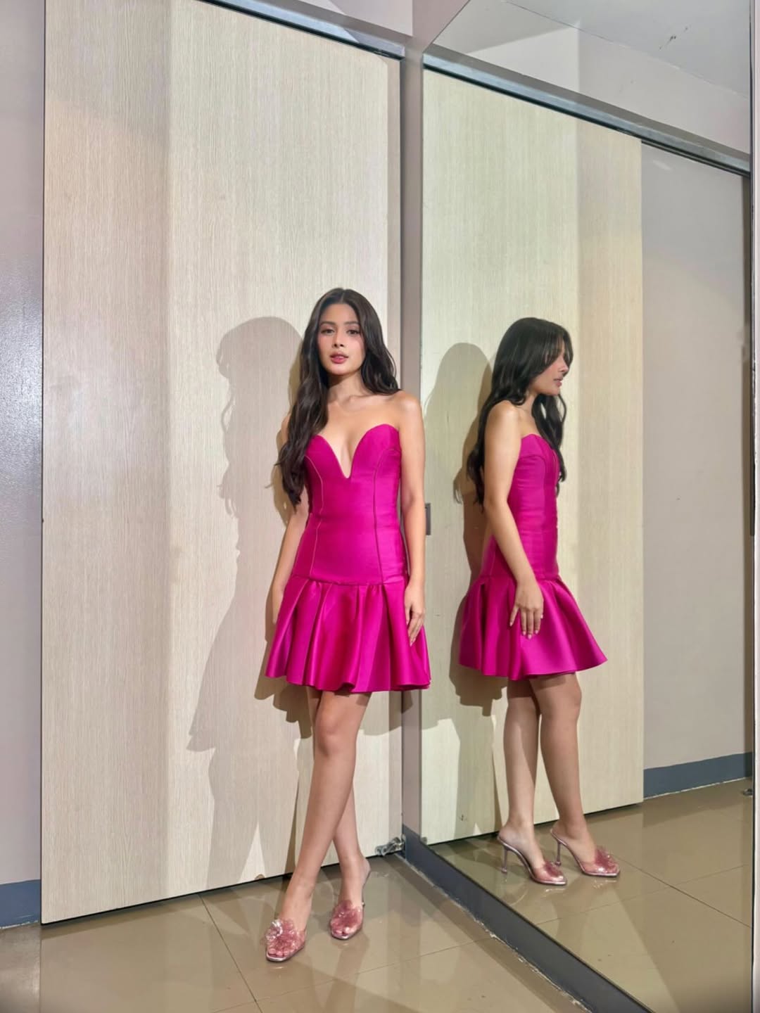 Model in elegant dress at an appearance